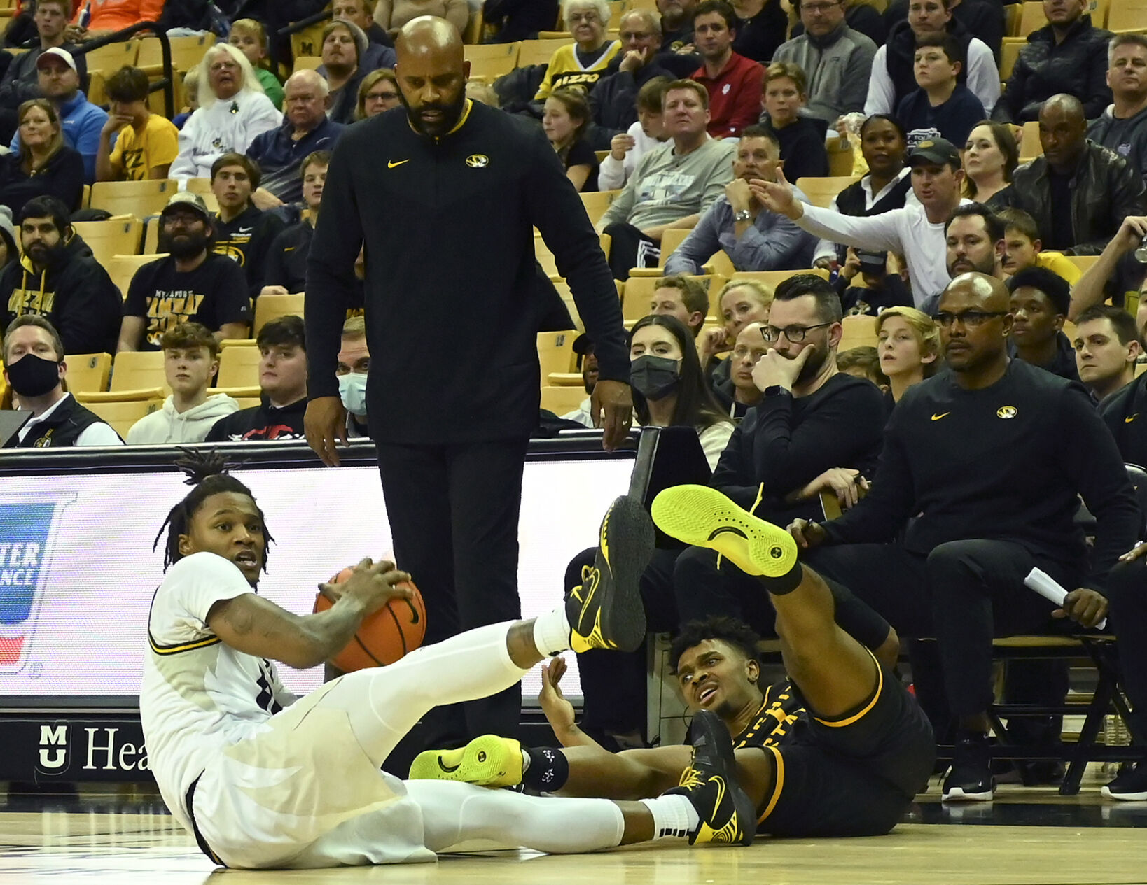 Missouri junior DaJuan Gordon beats Wichita State sophomore Tyson Etienne to the dead rebound and goes to pass it